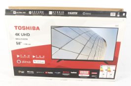 Toshiba 58" LCD television. Smart 4K Ultra HD, model: 58UL2163DB. With FreeView Play. Boxed.