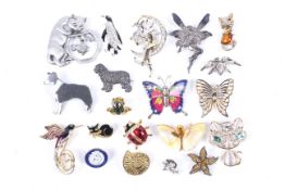 A collection of twenty various costume brooches.