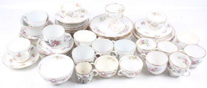 An assortment of teacups, saucers and plates.