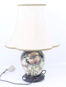A Moorcroft Poppy pattern table lamp base.