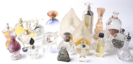 A collection of vintage glass perfume bottles.