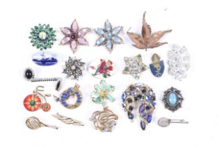 Twenty various costume brooches, some stone set.