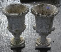 A pair of circa 1940 Rip Rod Vietata Papini crushed marble classical shaped urns.
