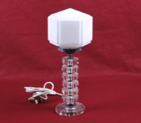 An Art Deco style stacked clear glass block table lamp.