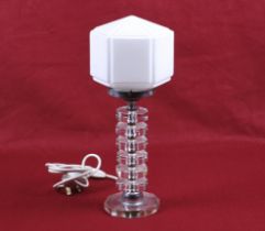 An Art Deco style stacked clear glass block table lamp.