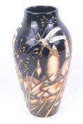 A Moorcroft limited edition Cranefly vase. Signed Paul Hilditch, 2009. Number 20/150.