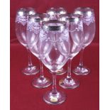 A set of six large Italian wine glasses. With silvered rims and engraved decoration, H25.