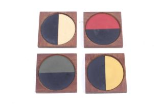 A set of four Laurids Lonborg Denmark wooden drinks coasters.