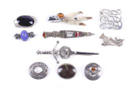 Ten silver and white metal brooches on a Scottish and Celtic theme.