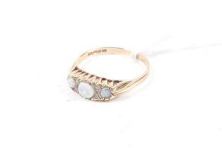 A vintage 9ct gold, opal and diamond dress ring.
