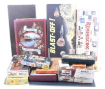 An assortment of vintage models and games.