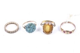 Four vintage dress rings.
