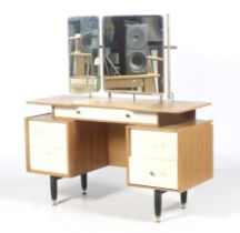 A mid-century E Gomme G-Plan (EG gold stamp) oak dressing table.