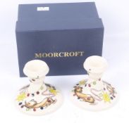A Moorcroft pair of candlesticks with Mouse Design by Emma Bossons. Dated 2011. Boxed.