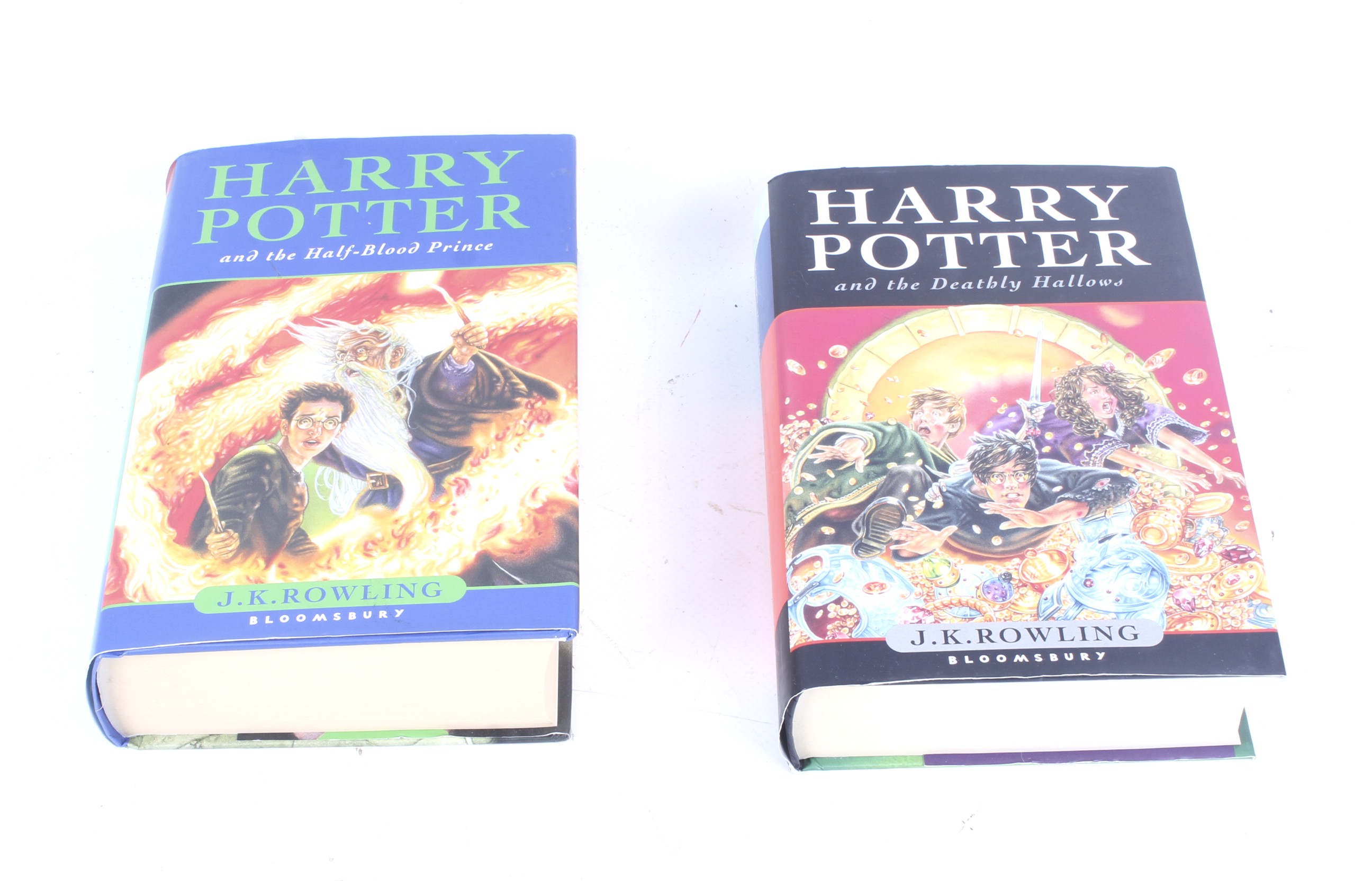 Two first edition Harry Potter books.