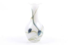 An Okra iridescent glass vase.