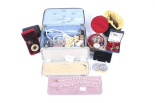 An assortment of costume jewellery and collectables.