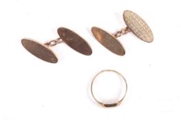 A pair of 9ct gold oval twin panel cufflinks and an oblong signet ring.