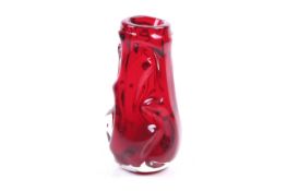 A mid-century Whitefriars ruby red knobbly vase by William Wilson / Harry Dyer.