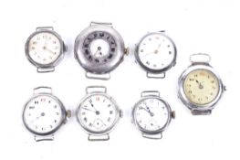 Seven silver (925) trench-type watches.