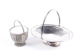 A silver-plated woven-mesh sugar basket and a silver-plated oval cake basket.