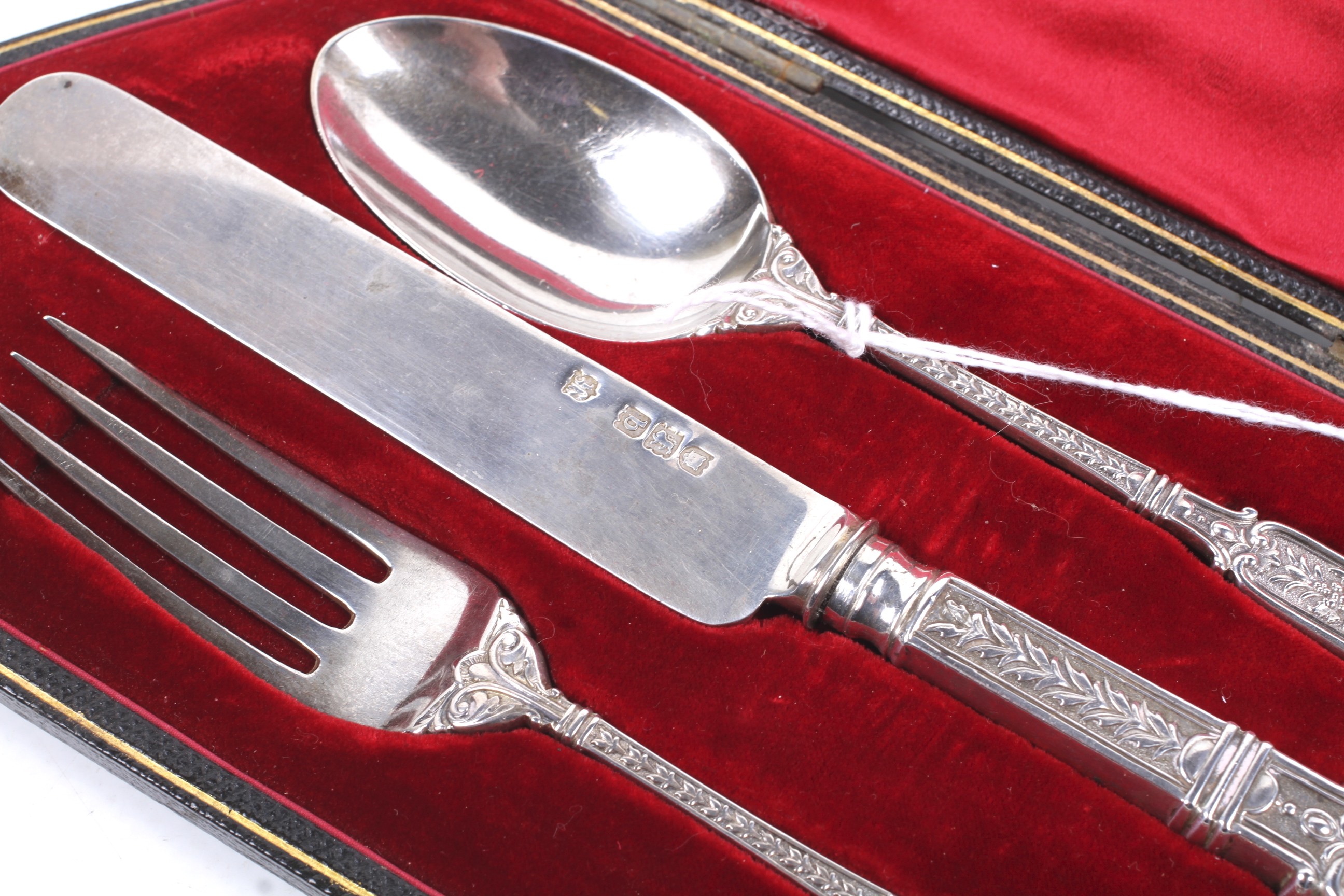 A late Victorian silver christening knife, fork and spoon set. - Image 2 of 2