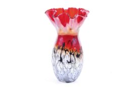 A contemporary large red fluted Murano Glass vase.