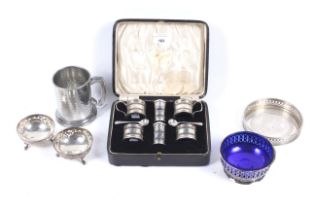 A silver pierced-round six-piece cruet set and other items.
