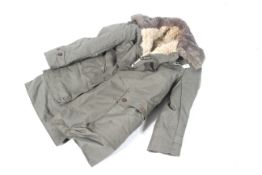 A vintage Mats Larsson M1909 Swiss army parka coat.