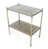 A small mid-century brass two tier trolley inset leather tops.