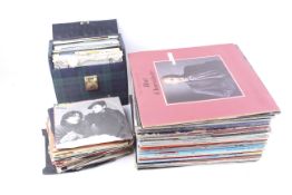 A collection of vintage 45rpm vinyl singles.