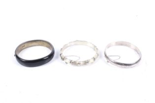 Three sterling silver hinged bangles.