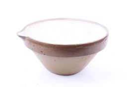 A vintage stoneware saltglazed kitchen bowl.