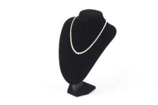 A cultured pearl single row necklace.