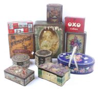 A collection of assorted vintage advertising product storage tins.