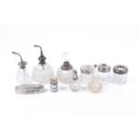 A collection of silver mounted glass vanity items.