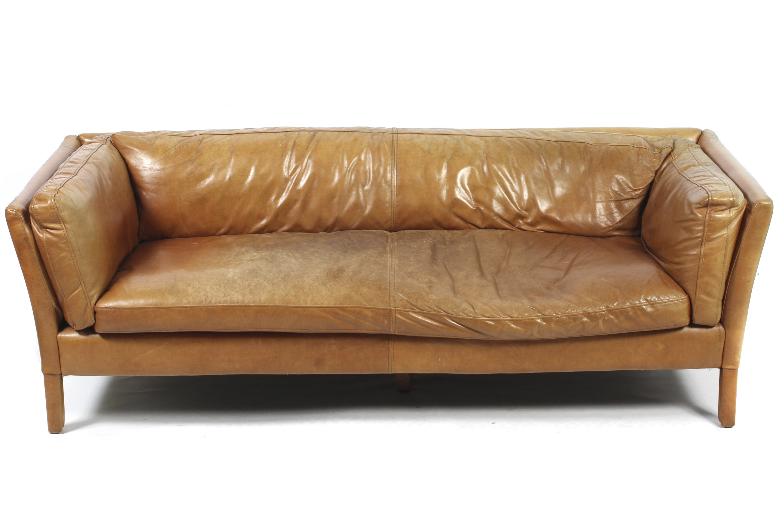 A contemporary John Lewis Scandinavian style tan leather three-seater sofa.
