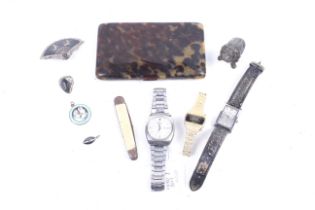 A Seiko 5 bracelet watch and other objects and jewellery.