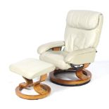 A contemporary unbranded light grey leather recliner swivel lounger armchair and footstool.
