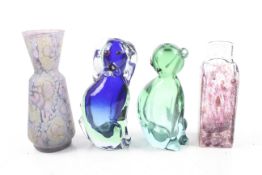 Four glass vases.