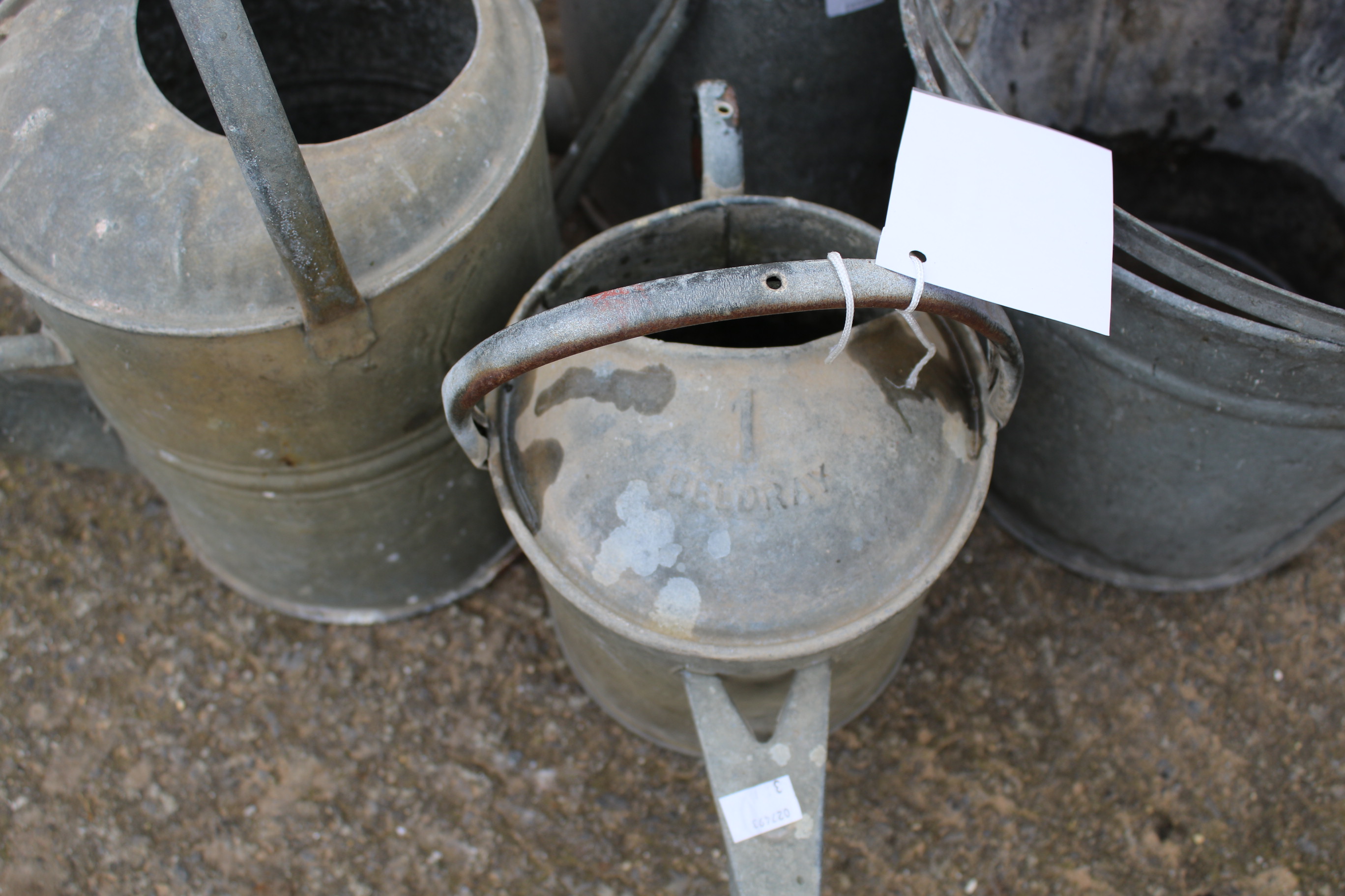 Three galvanised watering cans and two buckets. - Image 2 of 3