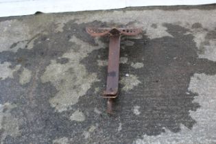 A cast iron plough seat. Stamped 'Albion no. 5329', L78cm.