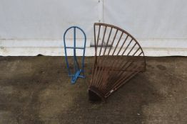An antique hay rack and saddle rack.