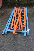 A quantity of blue and orange industrial racking.