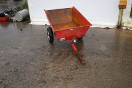 A Saxon garden dump trailer. In red, wheels are free, complete with handbrake.