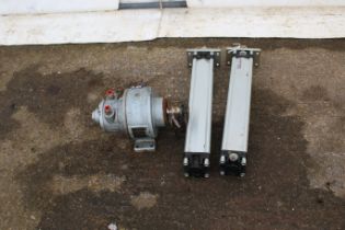 Two air rams and an air motor. Air rams max pressure 10 bar.