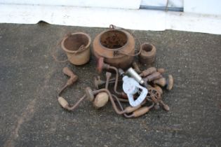 Three cast iron carpentry glue pots and a collection of brazes. Pots stamped on base.