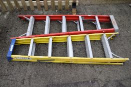 Two sets of electrician's fibreglass step ladders. By Chance and Cuprum.