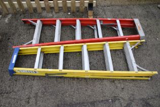 Two sets of electrician's fibreglass step ladders. By Chance and Cuprum.