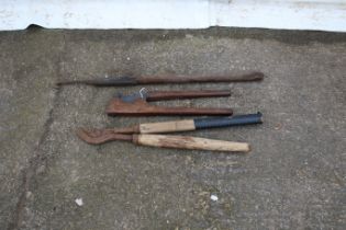 Three antique tail dockers. Including one mahogany handled example stamped 'Arnold'.